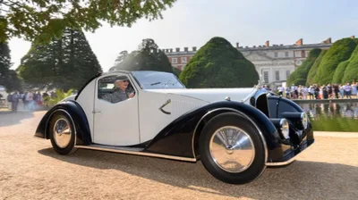 Devanture de Dominique Tessier Restaurateur d'Automobiles Classiques